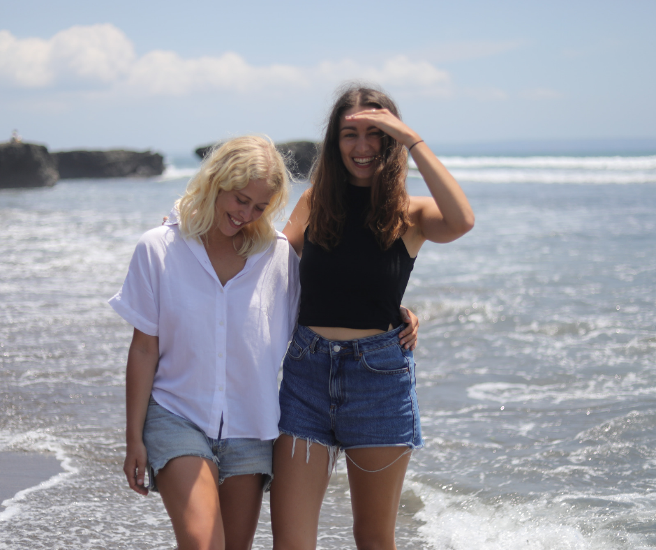 Ocean Mimic founders on the beach 