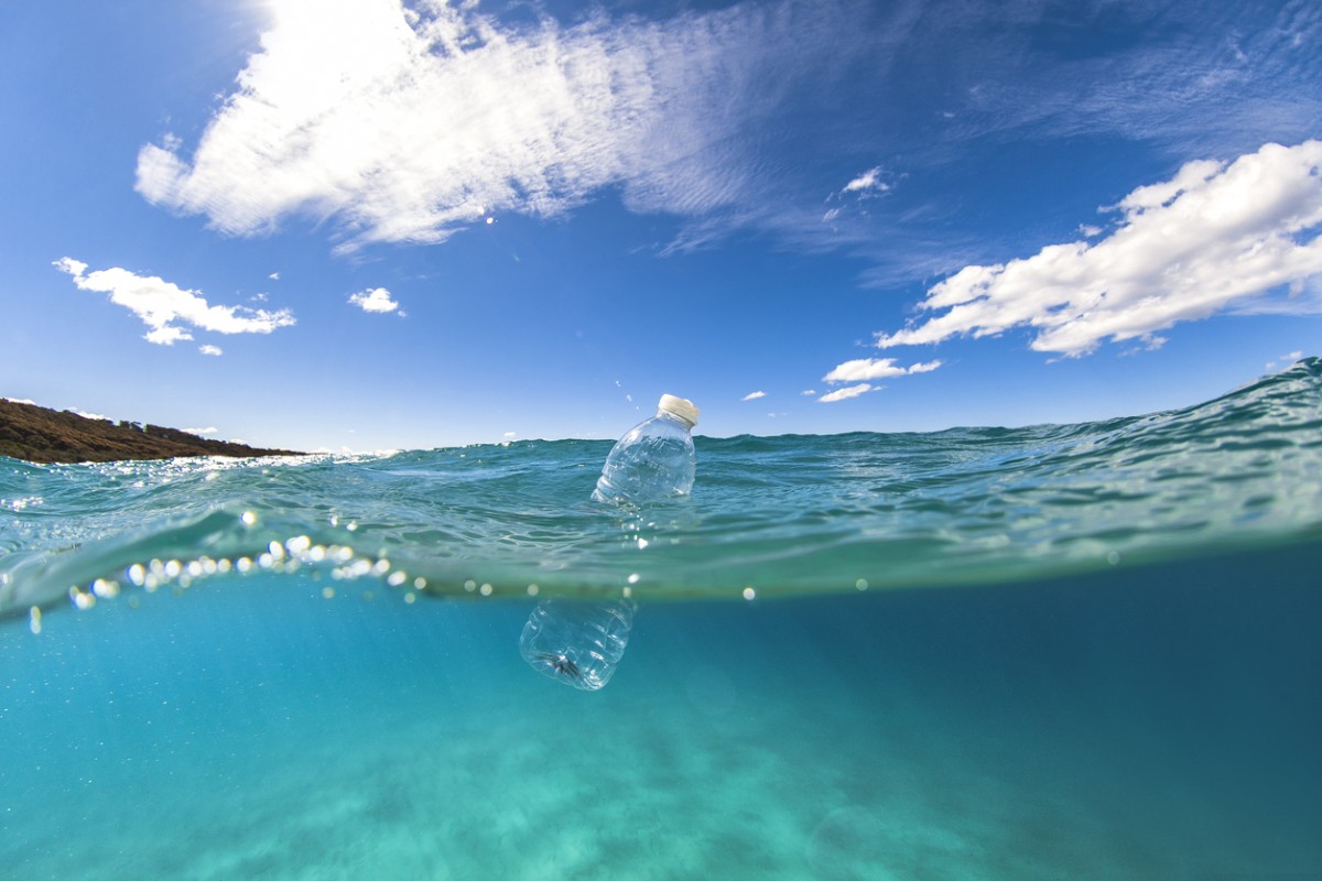 Plastic bottle floats in ocean: lindsay_imagery Project AWARE