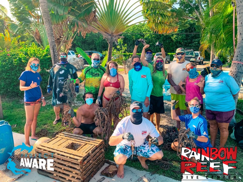 Rainbow Reef Crew After Dive Against Debris